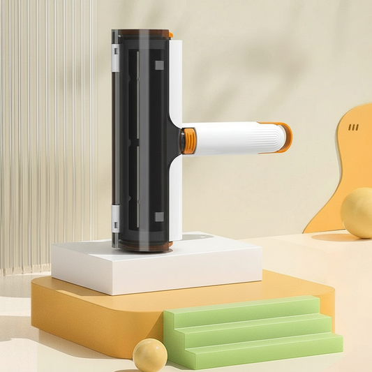 Pet hair removal roller with a clear cover showing pet hair on a white background