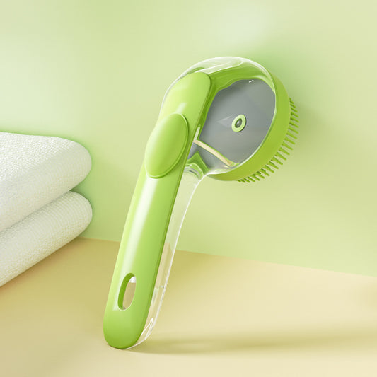 Green pet grooming tool on a light green background