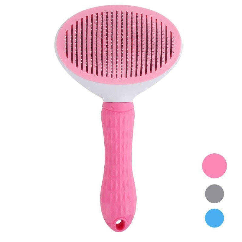 Pink pet grooming brush on a white background with color swatches below.