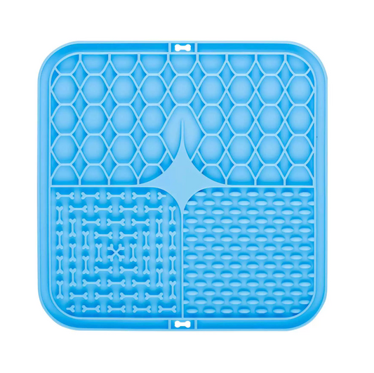 Blue silicone mat with various patterns on a white background