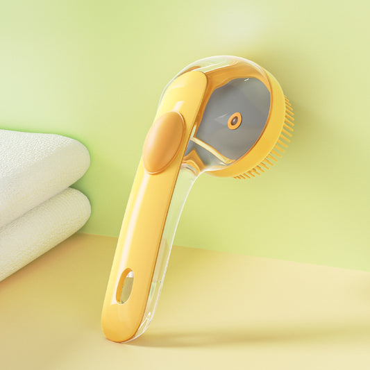 Yellow and gray grooming tool on a light green background