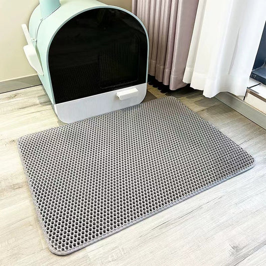 Double-layer EVA cat litter mat placed under a covered litter box to trap scattered litter